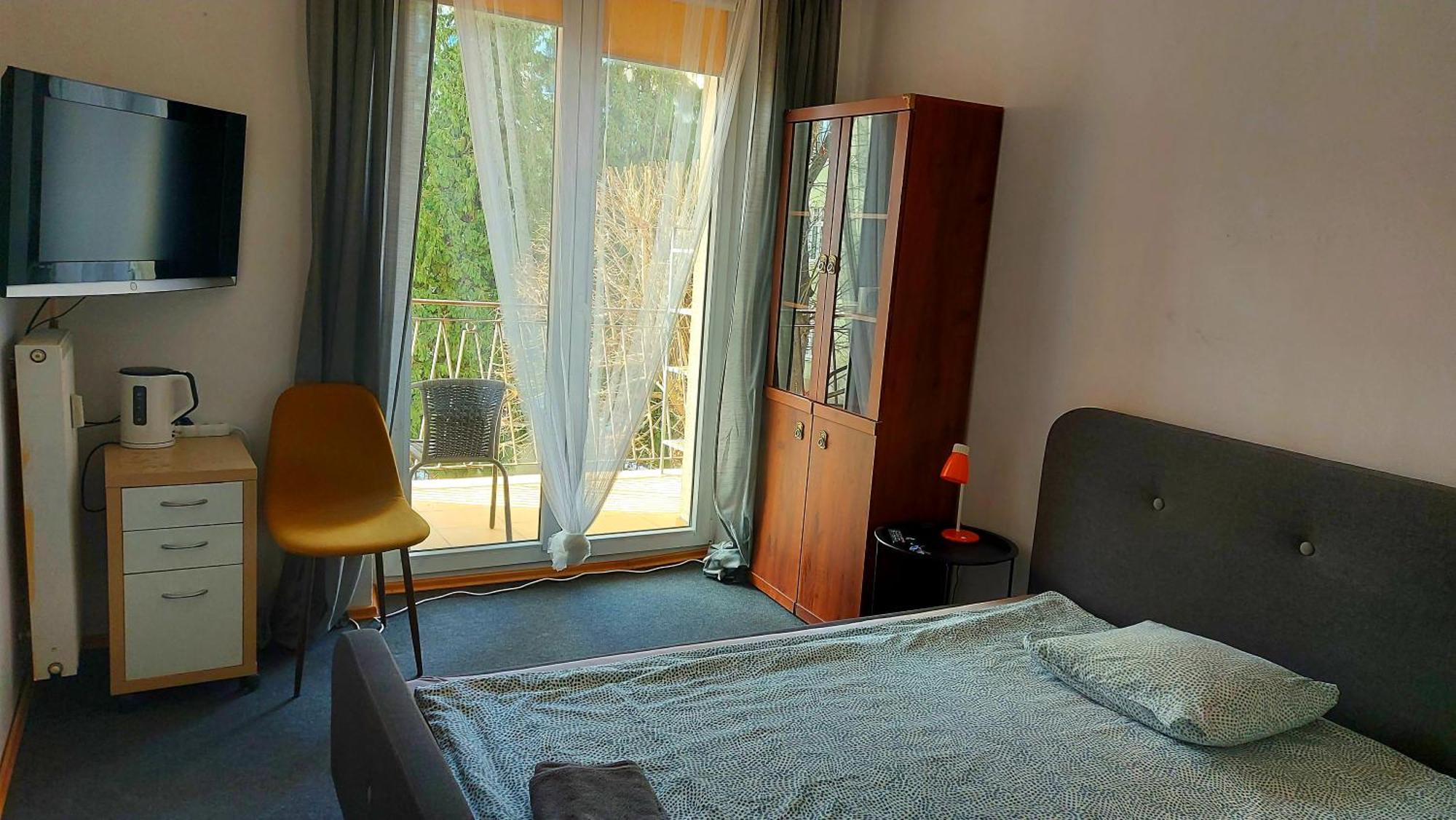 Citysopot-Centrum-Dabrowskiego Rom bilde